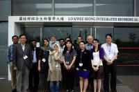 A group photo of our School members [including Prof. Yung Wing-ho (1st from right) and Prof. Ke Ya (2nd from right)] and guests taken outside the Lo Kwee-Seong Integrated Biomedical Sciences Building.